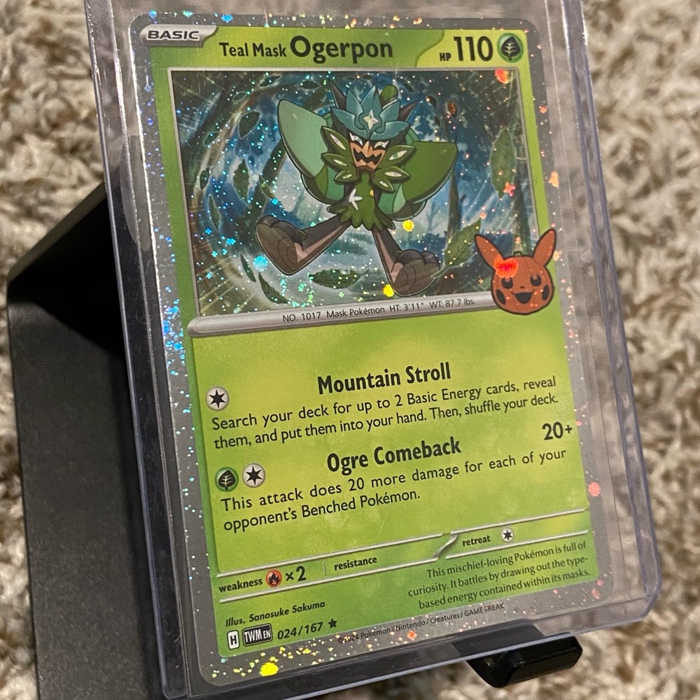 POKEMON Ogerpon Swirls Cosmos Holo Trick Or Trade Pikachu Stamp TCG Card